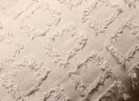 Coussin beige à formes carrées texturées 45x45 cm ELVIO